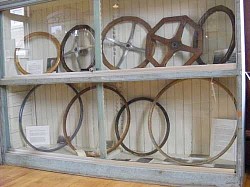 Display of wooden steering wheels & bicycle rims